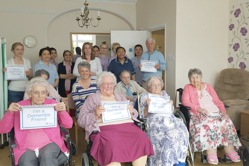 Nurse and residents painting